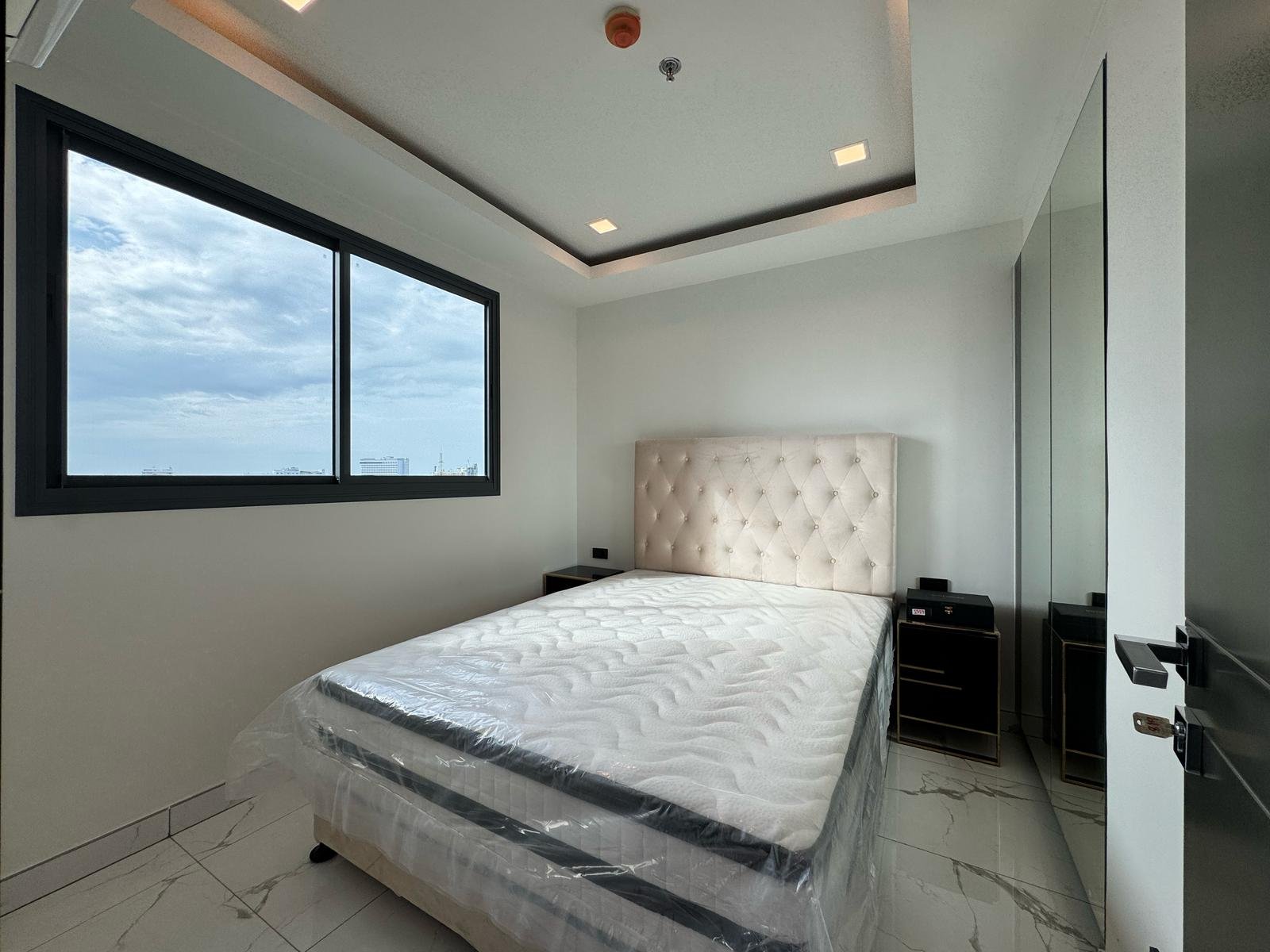 Millennium Tower Pattaya - High-Floor Modern 1BR with City Views - select property pattaya